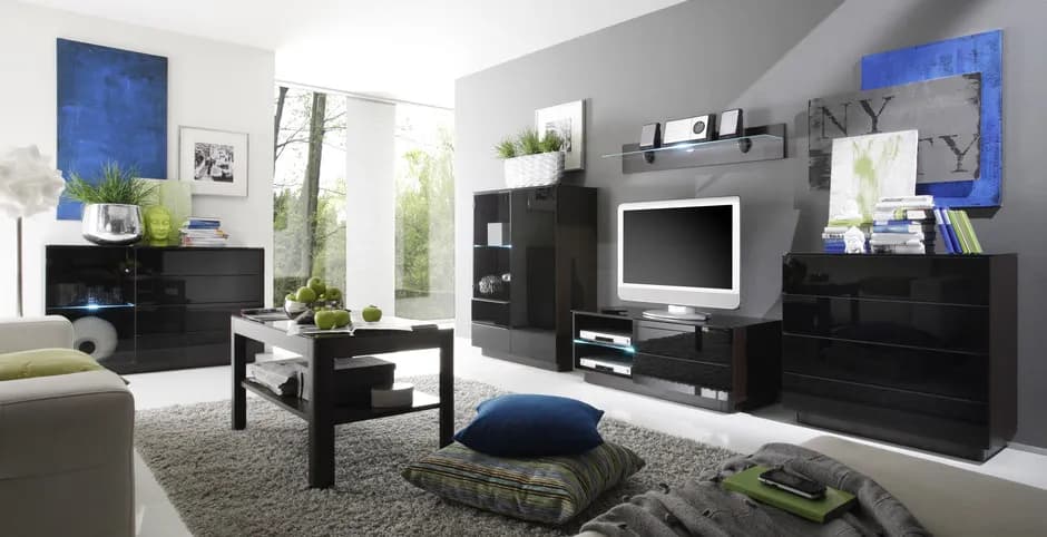 Jakie dodatki do ciemnych mebli w salonie, by stworzyć przytulność?